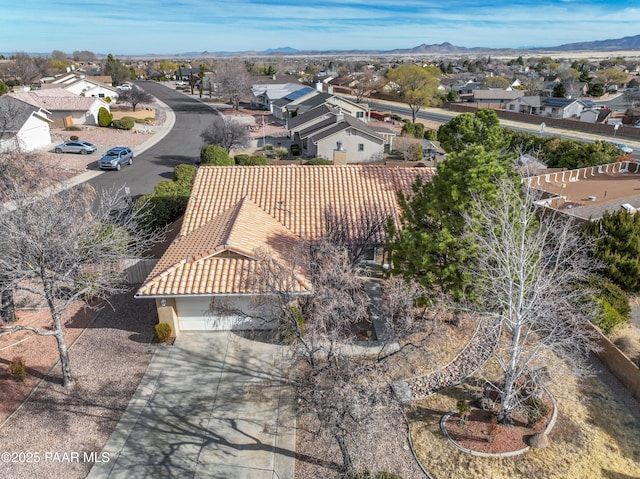 aerial view with a mountain view and a residential view