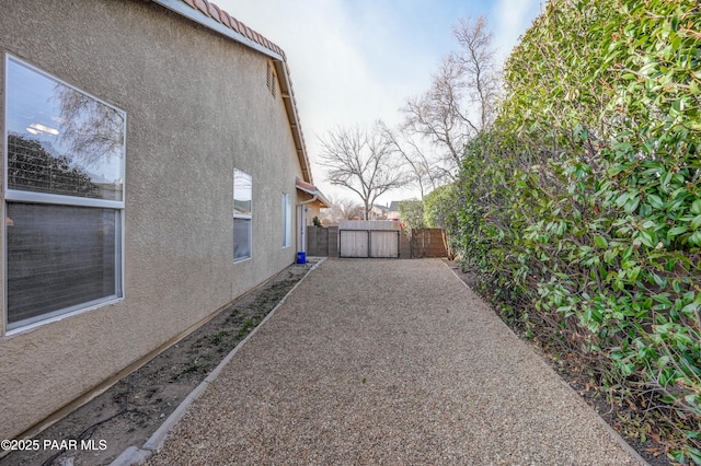 view of yard with a gate and fence