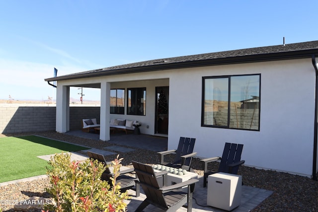 rear view of house with a patio area