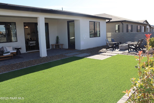 back of house featuring a patio area