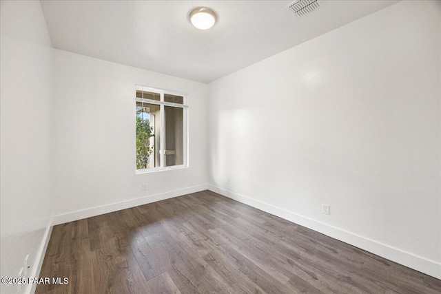 empty room featuring hardwood / wood-style floors