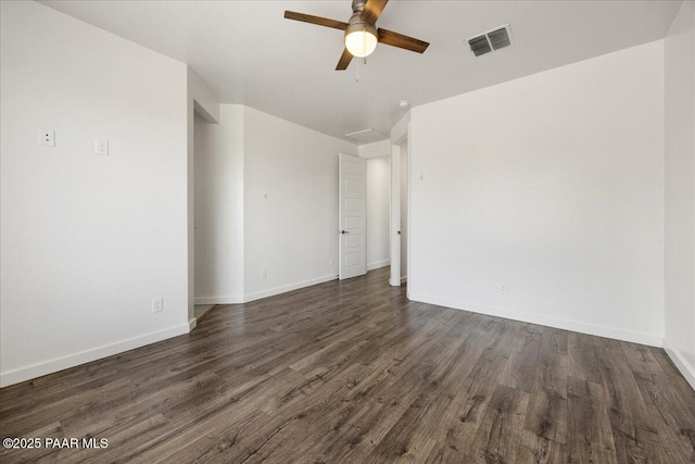 unfurnished room with ceiling fan and dark wood-type flooring