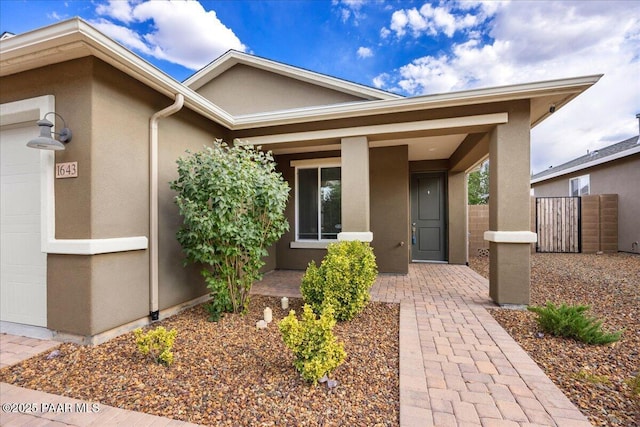 entrance to property with a porch