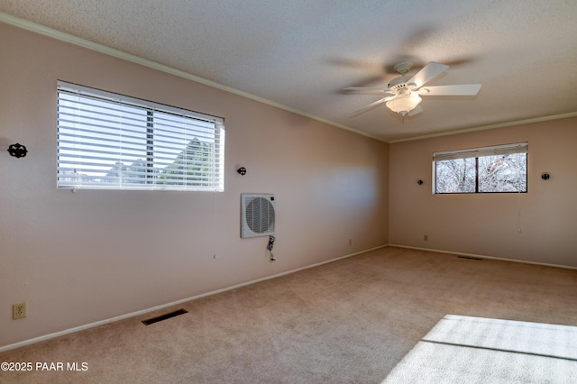 1086 N Broken Wagon Trl, Dewey-Humboldt, AZ 86327 - carpeted spare room featuring a ceiling fan, ornamental molding, and a textured ceiling