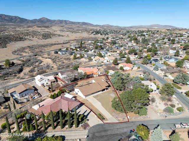 1086 N Broken Wagon Trl, Dewey-Humboldt, AZ 86327 - aerial perspective of suburban area featuring property parcel outlined and mountains