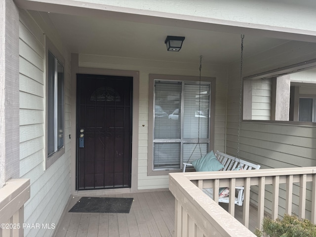 property entrance with a porch
