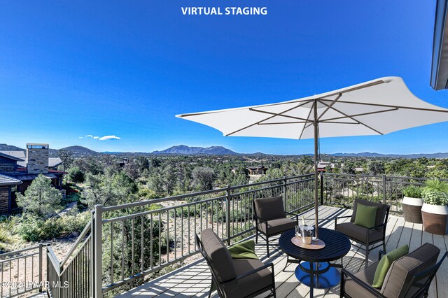 deck with a mountain view