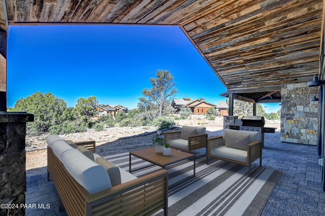 view of patio / terrace with an outdoor hangout area and grilling area