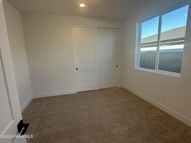 view of carpeted spare room