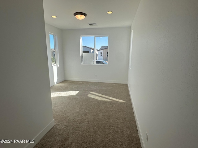 view of carpeted spare room