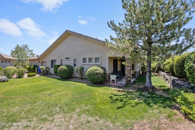 1222 Crown Ridge Dr, Prescott, AZ 86301 - view of front of property featuring stucco siding, a front yard, and a patio
