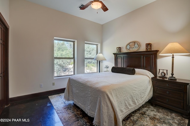 bedroom featuring ceiling fan and vaulted ceiling