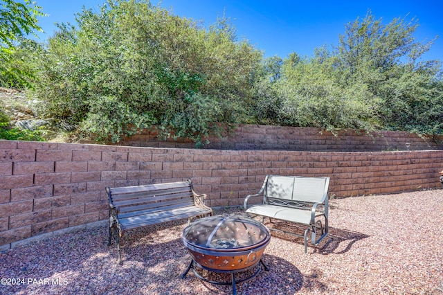 view of patio featuring a fire pit