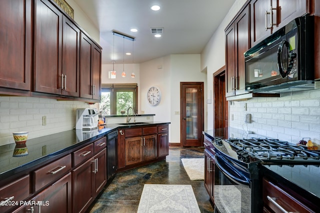 kitchen with black appliances, decorative backsplash, pendant lighting, and sink