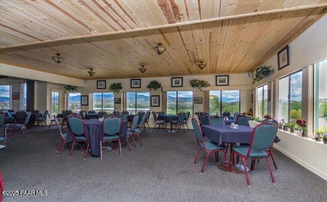 1005 N Rolling Green Rd, Dewey-Humboldt, AZ 86327 - carpeted dining space featuring wood ceiling and healthy amount of natural light