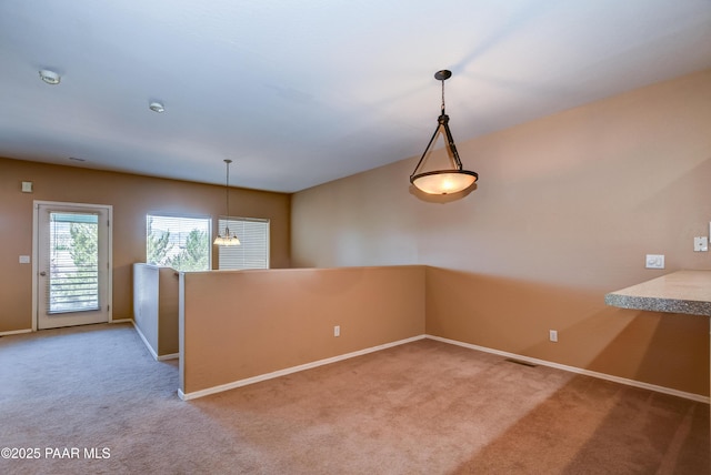1005 N Rolling Green Rd, Dewey-Humboldt, AZ 86327 - spare room featuring light carpet and a smoke detector