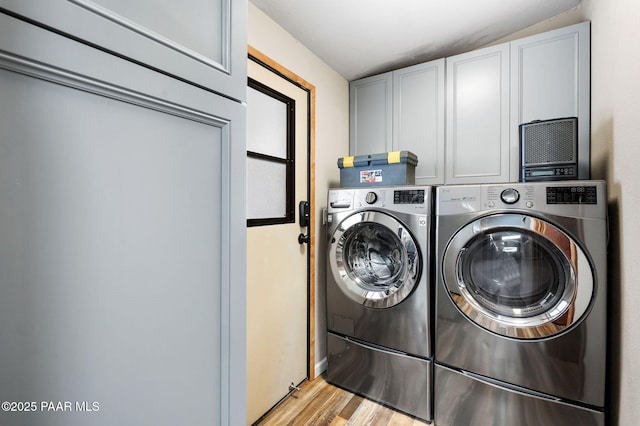 10157 Manzanita Trl, Dewey-Humboldt, AZ 86327 - laundry room featuring cabinet space, light wood finished floors, and washing machine and clothes dryer