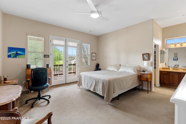 2117 Colter Bay Ct, Prescott, AZ 86301 - bedroom with light colored carpet, access to outside, a desk, french doors, and ensuite bath