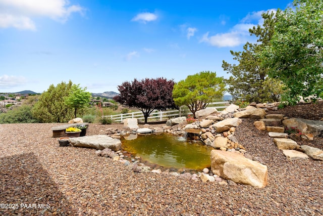 2117 Colter Bay Ct, Prescott, AZ 86301 - view of yard with a mountain view and a small pond