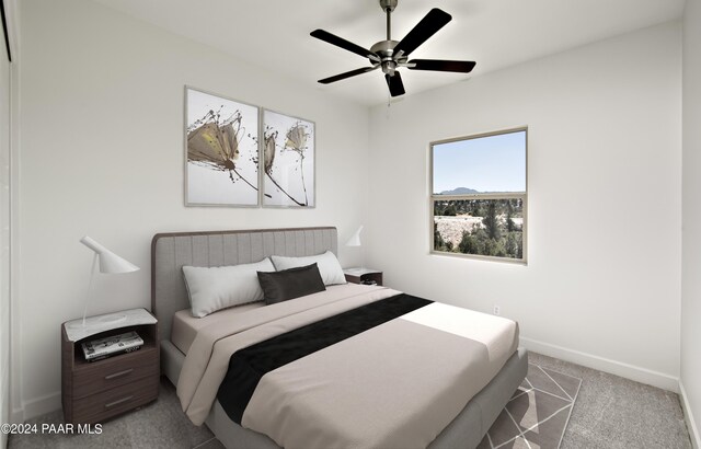 5948 W Cedron Cir, Prescott, AZ 86305 - carpeted bedroom with baseboards and ceiling fan