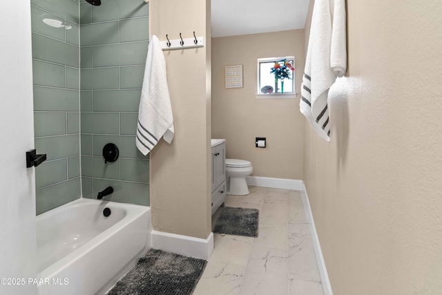 full bathroom with vanity, toilet, and tiled shower / bath