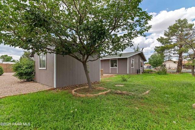 view of yard with a storage shed