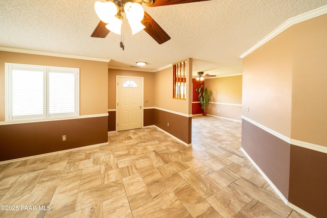 438 Jasmine Ln, Prescott, AZ 86301 - spare room with ceiling fan, crown molding, a textured ceiling, and baseboards