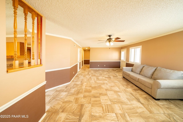 438 Jasmine Ln, Prescott, AZ 86301 - living room with ornamental molding, ceiling fan, a textured ceiling, and baseboards