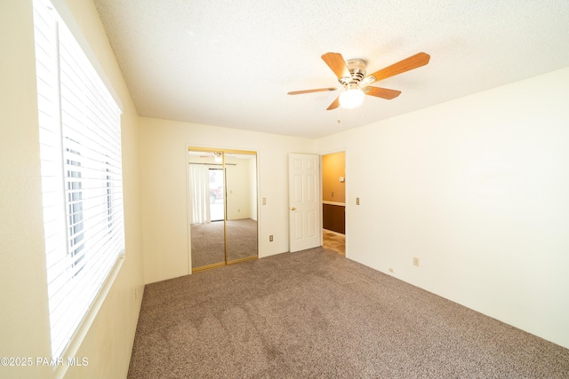 438 Jasmine Ln, Prescott, AZ 86301 - unfurnished bedroom featuring carpet, a closet, and a ceiling fan