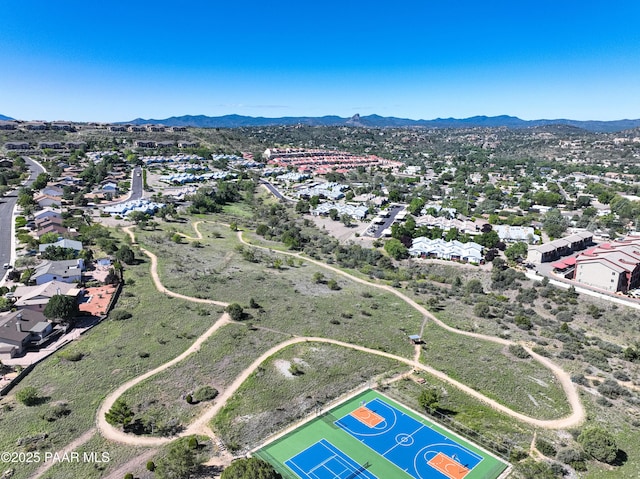 birds eye view of property featuring a mountain view and a residential view