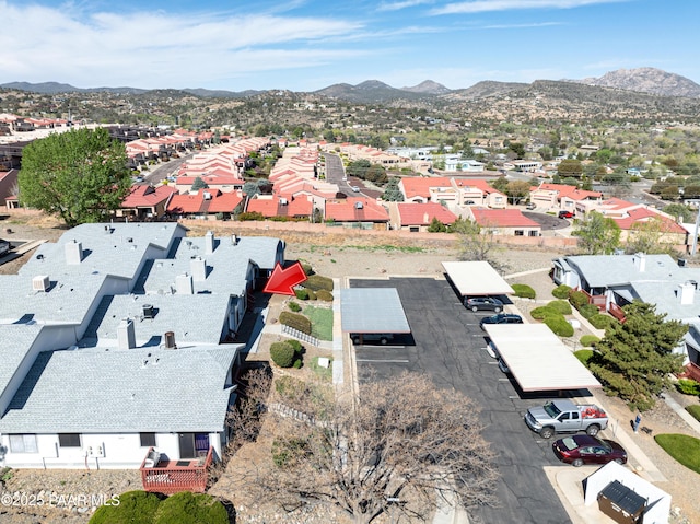 aerial view featuring a mountain view and a residential view