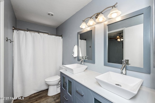 2770 Ridge Rd, Prescott, AZ 86301 - full bath with wood finished floors, double vanity, and ceiling fan