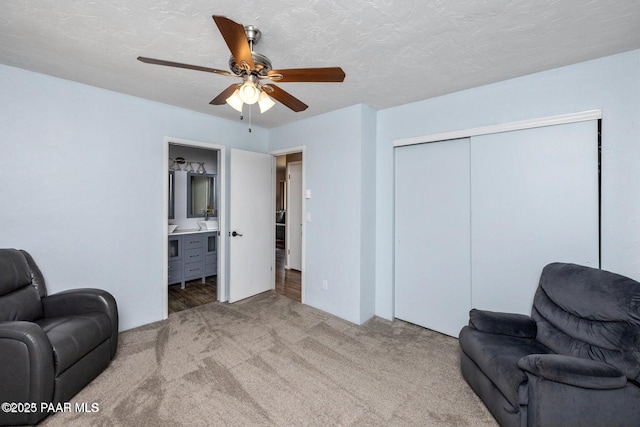 2770 Ridge Rd, Prescott, AZ 86301 - sitting room with carpet floors, a ceiling fan, and a textured ceiling
