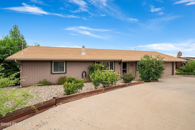 2770 Ridge Rd, Prescott, AZ 86301 - ranch-style home featuring a garage, driveway, and roof with shingles