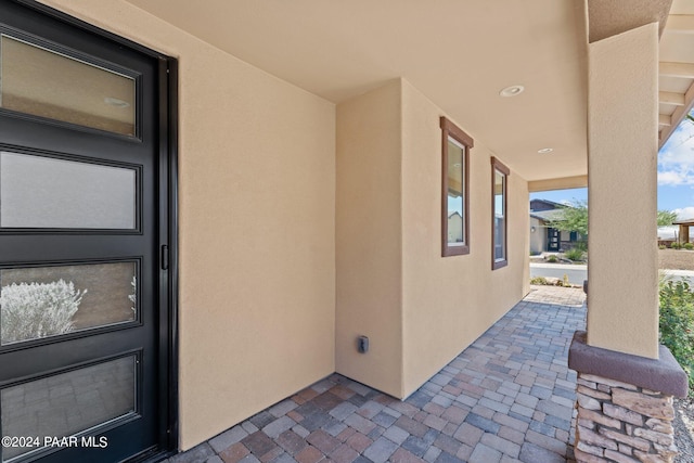 entrance to property with a porch