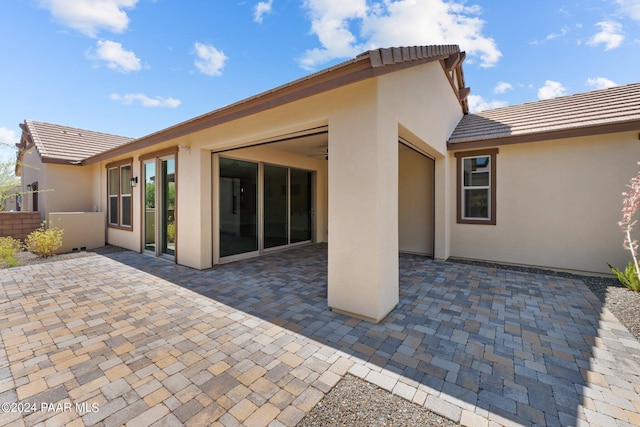 back of house featuring a patio area