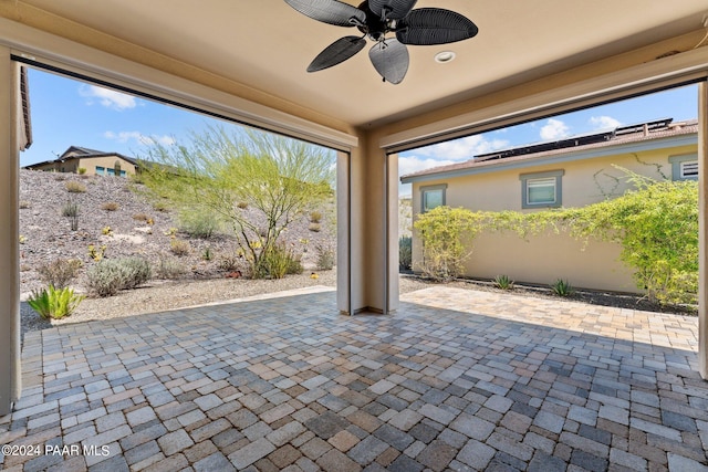 view of patio with ceiling fan