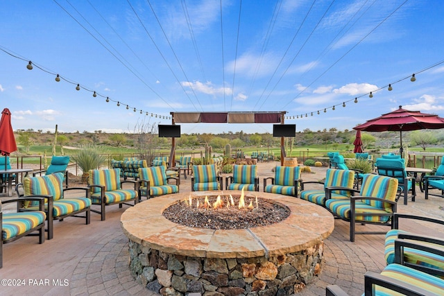 view of patio with an outdoor fire pit