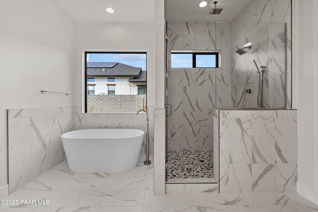 4655 E Alma Ln, Prescott Valley, AZ 86314 - bathroom with marble finish flooring, a marble finish shower, a soaking tub, recessed lighting, and tile walls