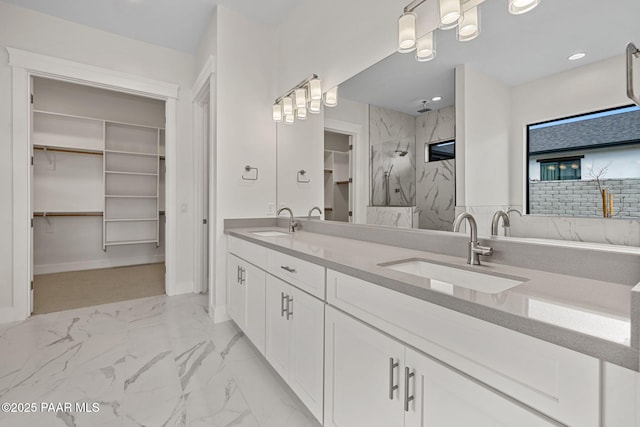 4655 E Alma Ln, Prescott Valley, AZ 86314 - full bathroom featuring a spacious closet, marble finish floors, a marble finish shower, double vanity, and recessed lighting