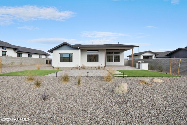 4655 E Alma Ln, Prescott Valley, AZ 86314 - rear view of property with a fenced backyard, a patio area, and stucco siding