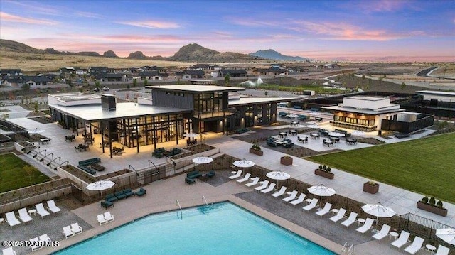 4655 E Alma Ln, Prescott Valley, AZ 86314 - aerial view at dusk of view of pool area and a mountain view