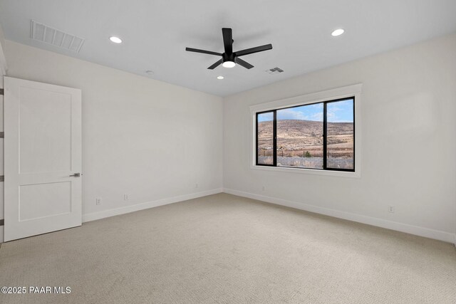 4655 E Alma Ln, Prescott Valley, AZ 86314 - empty room featuring light carpet, recessed lighting, and ceiling fan