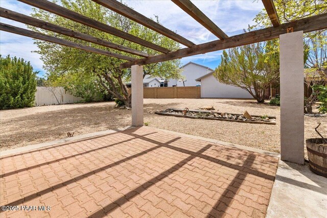 7521 Paseo Hermoso, Prescott Valley, AZ 86314 - view of patio / terrace with a fenced backyard and a pergola