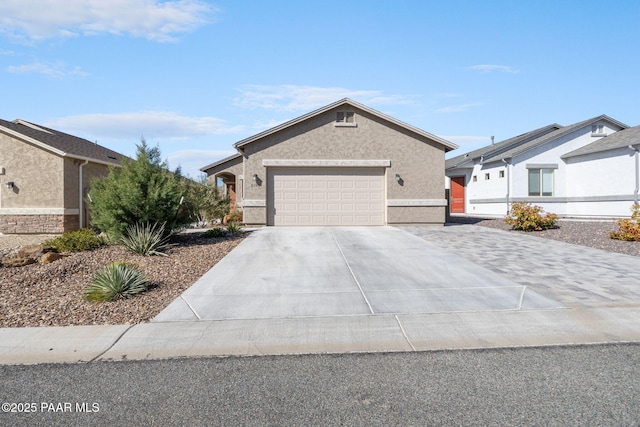 5180 N Elliot Ave, Prescott Valley, AZ 86314 - single story home with concrete driveway, stucco siding, and a garage