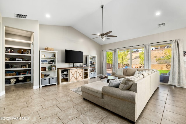 living room with light tile patterned floors, high vaulted ceiling, ceiling fan, and visible vents