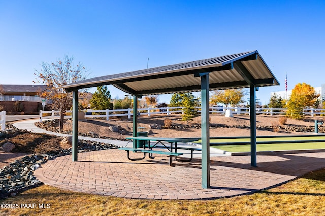surrounding community featuring fence