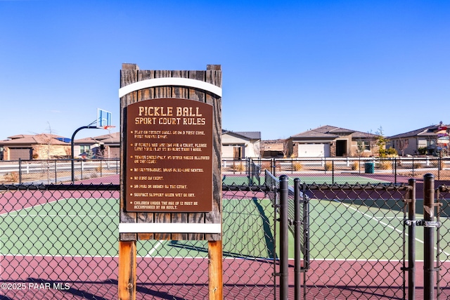 exterior space with fence and a gate
