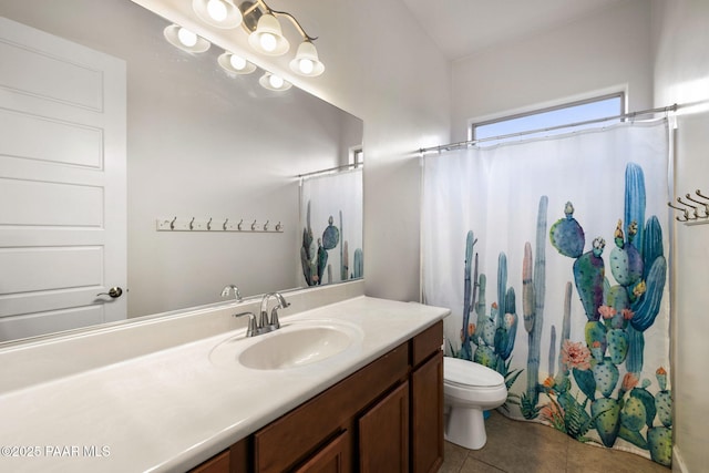 bathroom with tile patterned flooring, curtained shower, toilet, and vanity