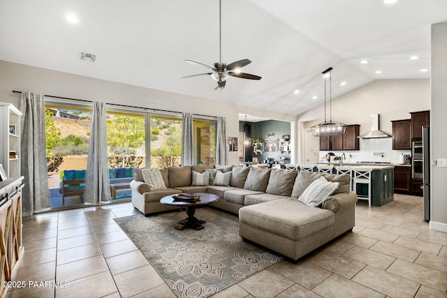 living room featuring ceiling fan, visible vents, high vaulted ceiling, recessed lighting, and light tile patterned flooring